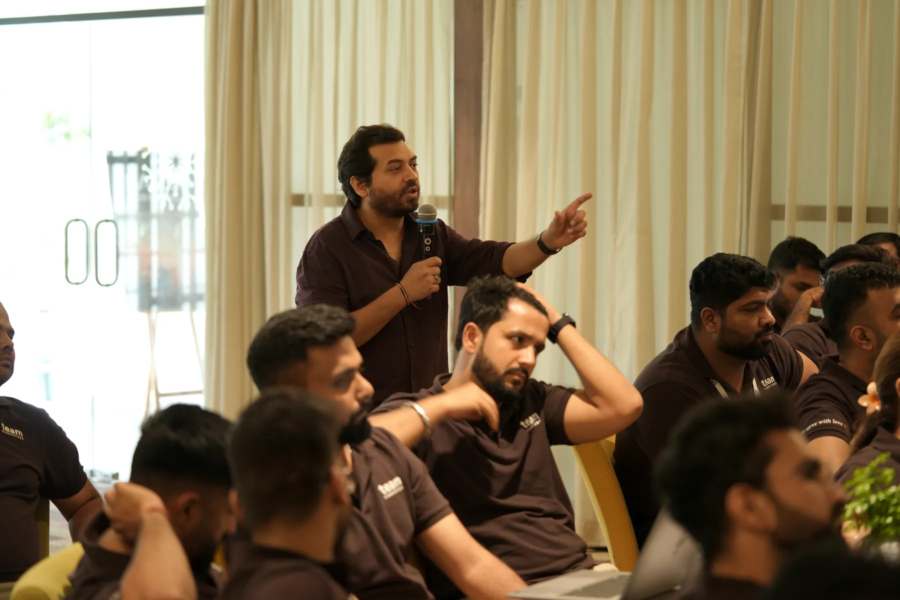 Sagar coaching participants during an interactive session