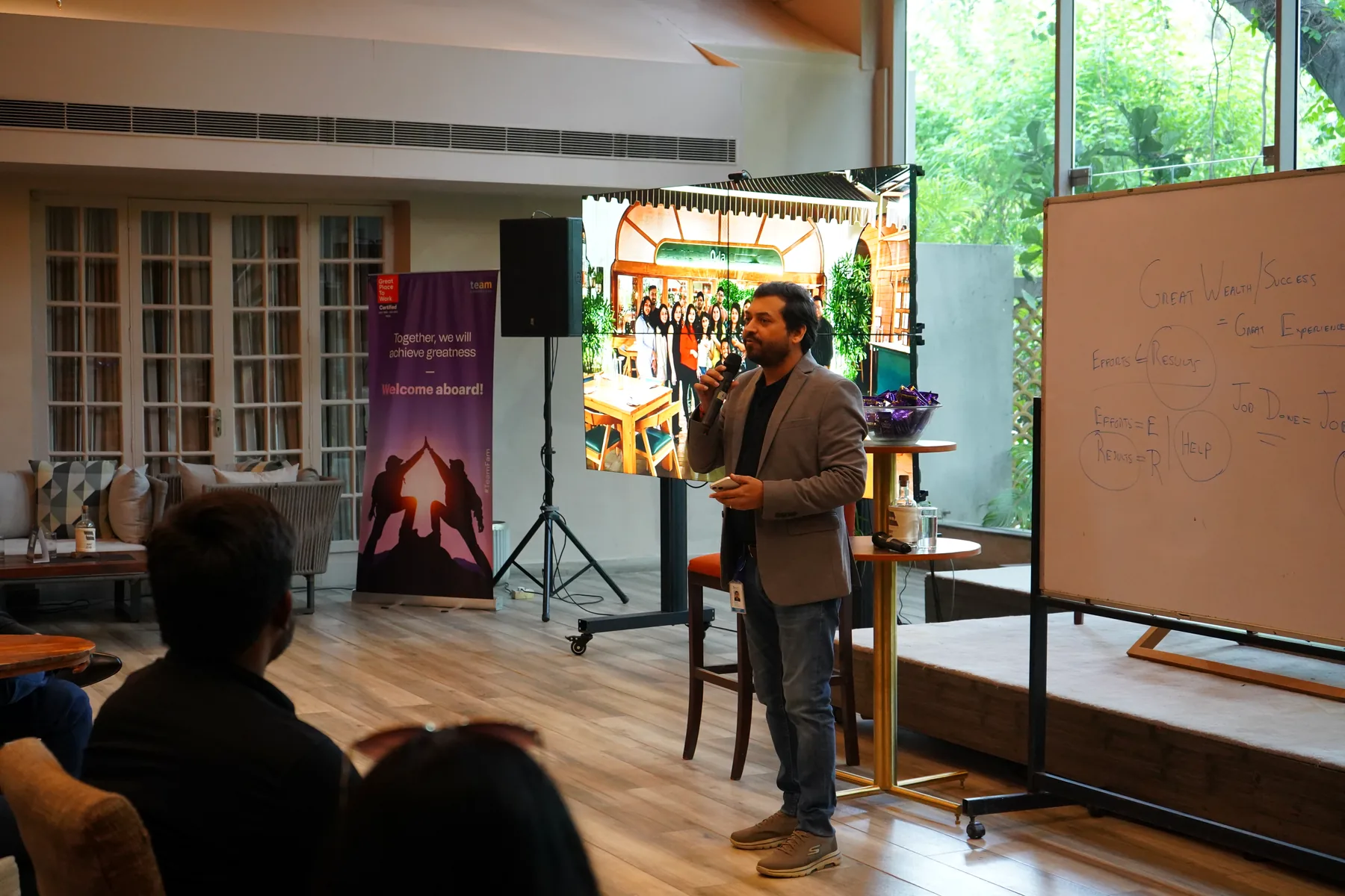 Sagar presenting an AI workflow to a group